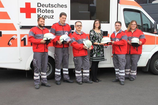 Wells Bullard presented Bullard helmets to members of the German Red Cross, in recognition of their efforts to service their community..jpg