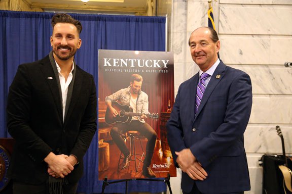 JD Shelburne with Gov. Beshear Senior Advisor Rocky Adkins who played Bluegrass music opening Kentucky Tourism press conference.JPG